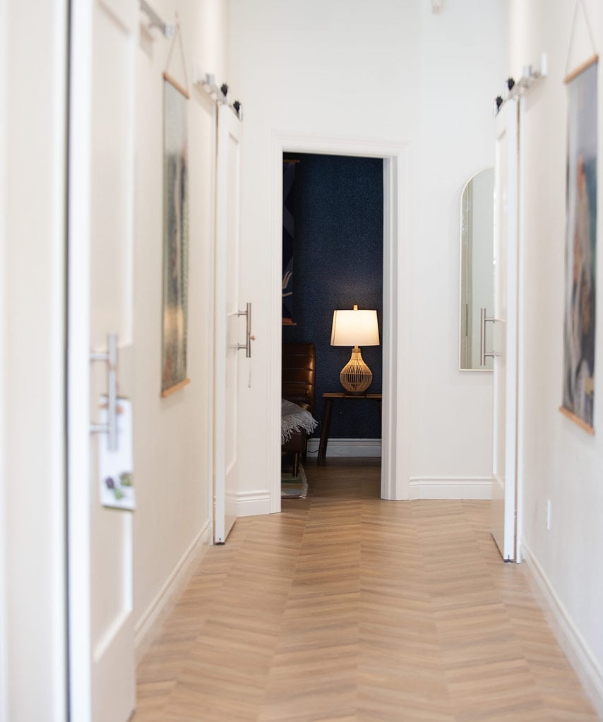 Urban Well MedSpa + Wellness hallway with relaxation room in background